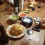 Roasted Cauliflower w Tahini Humus Olives Olive oil Wine