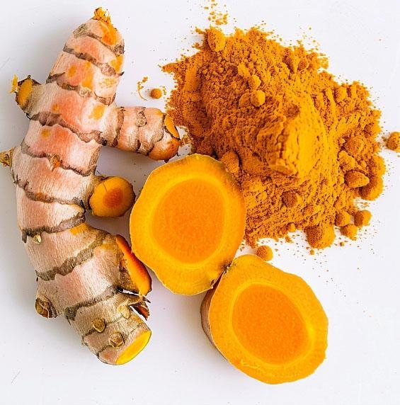 Nature's Treasure Trove: Unlocking the Synergistic Power of Botanical Medicine Against Cancer 2 Fresh turmeric root and ground turmeric — the source of curcumin